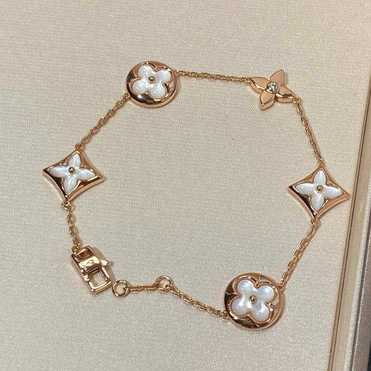 [Renovia Jewelry]STAR AND SUN 5 MOTIF MOP PINK GOLD BRACELET