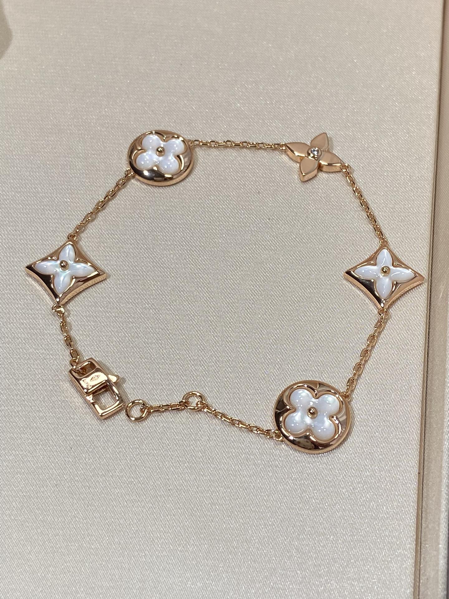 [Renovia Jewelry]STAR AND SUN 5 MOTIF MOP PINK GOLD BRACELET
