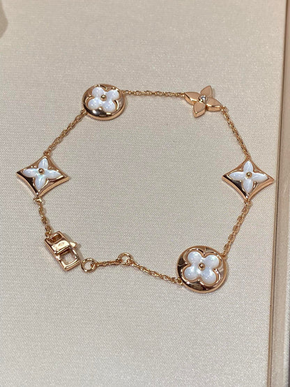[Renovia Jewelry]STAR AND SUN 5 MOTIF MOP PINK GOLD BRACELET