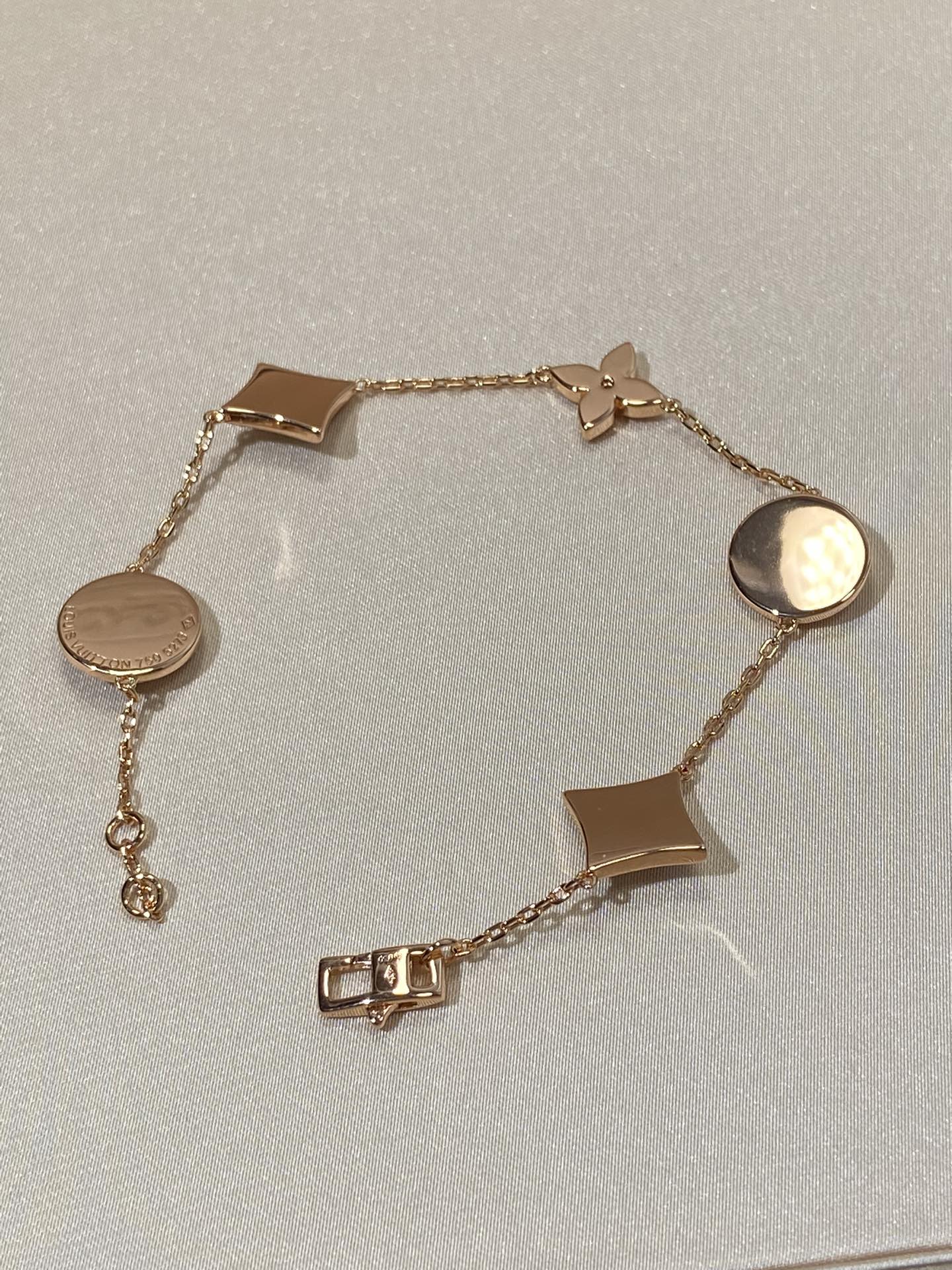 [Renovia Jewelry]STAR AND SUN 5 MOTIF MOP PINK GOLD BRACELET