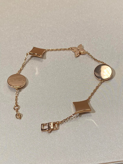 [Renovia Jewelry]STAR AND SUN 5 MOTIF MOP PINK GOLD BRACELET