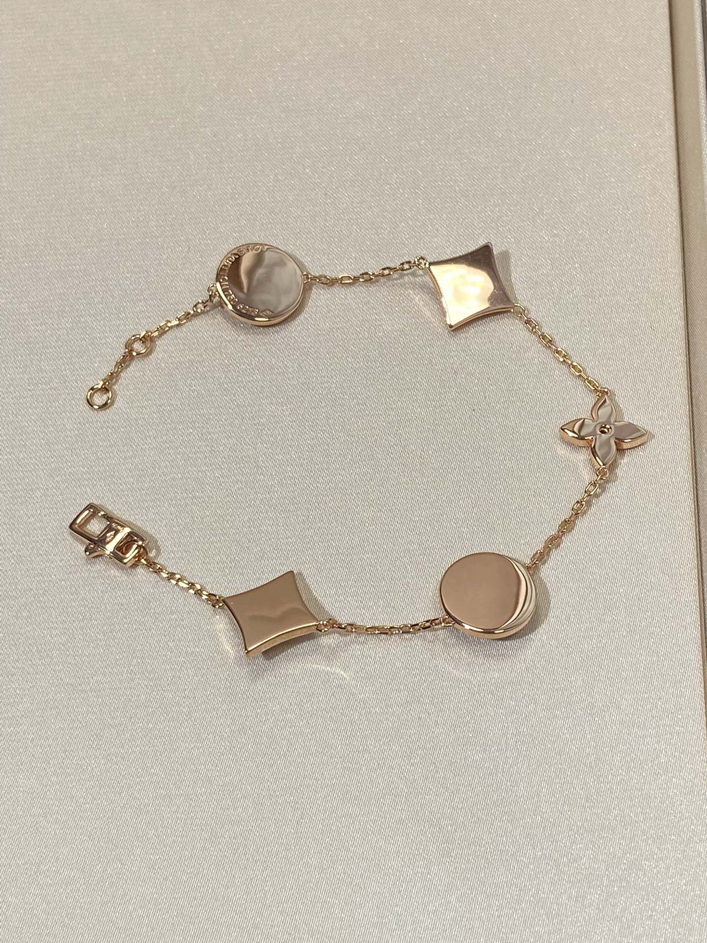 [Renovia Jewelry]STAR AND SUN 5 MOTIF MOP PINK GOLD BRACELET