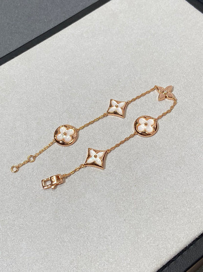 [Renovia Jewelry]STAR AND SUN 5 MOTIF MOP PINK GOLD BRACELET