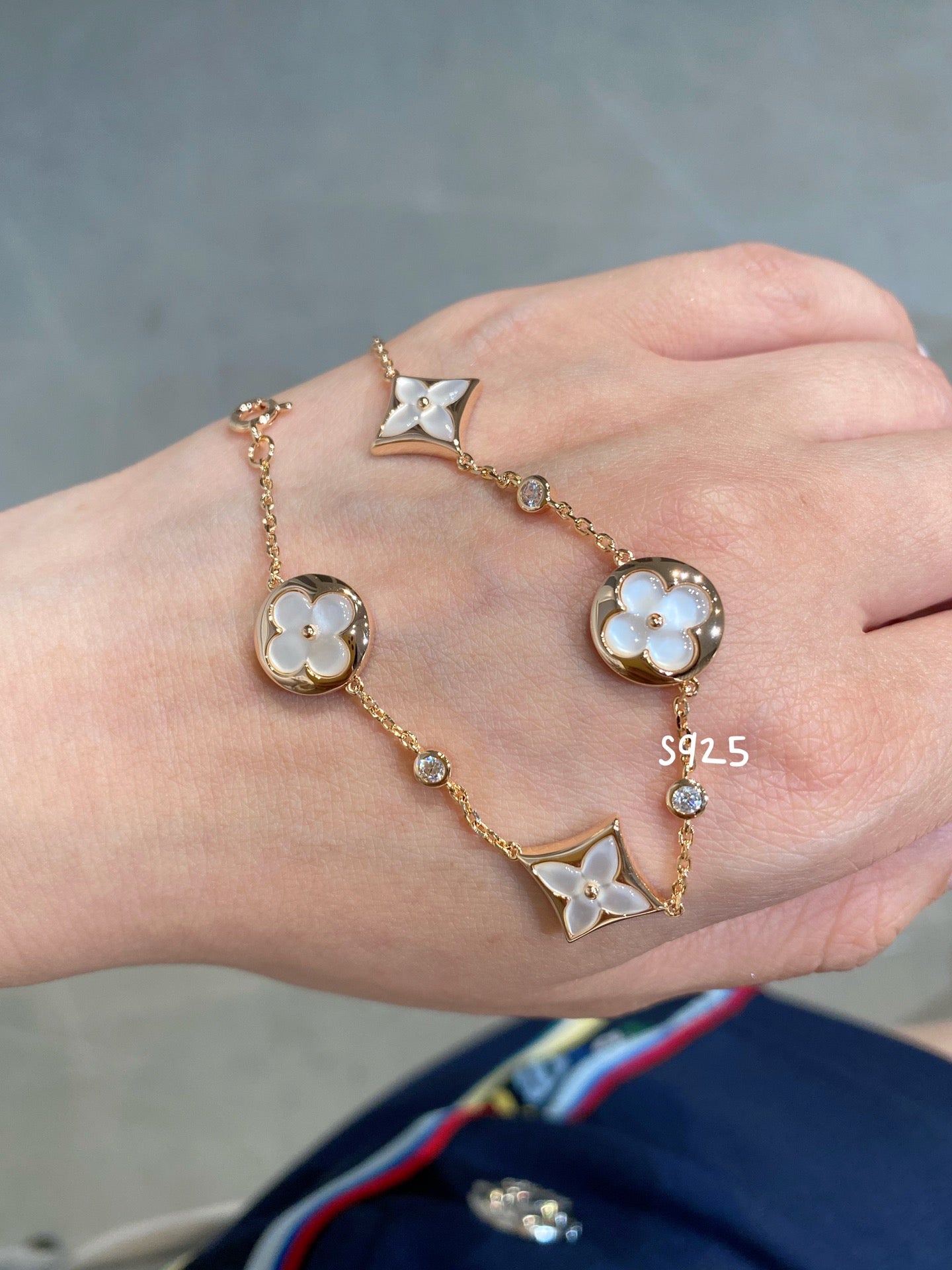 [Renovia Jewelry]STAR AND SUN 4 MOTIF WHITE MOP PINK GOLD BRACELET