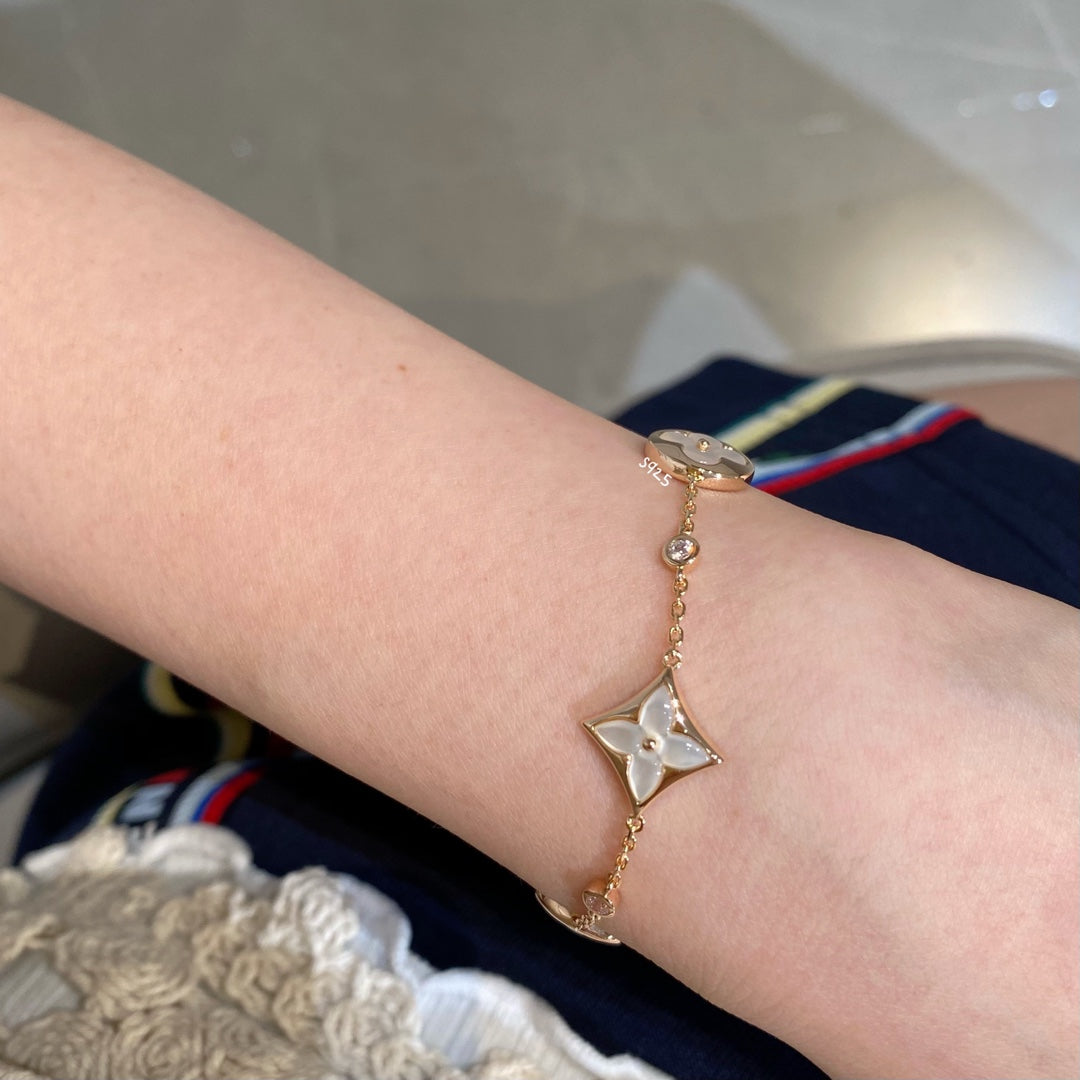 [Renovia Jewelry]STAR AND SUN 4 MOTIF WHITE MOP PINK GOLD BRACELET