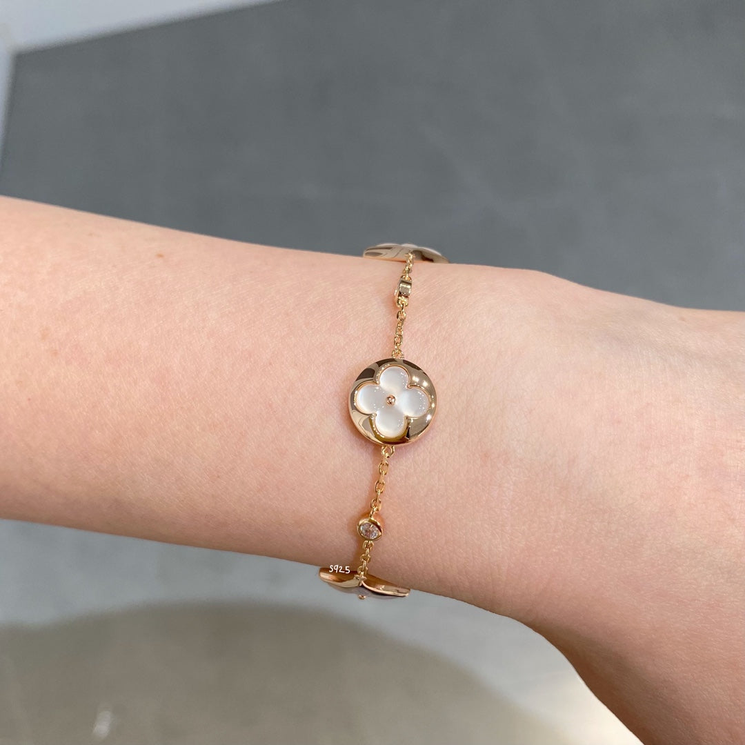 [Renovia Jewelry]STAR AND SUN 4 MOTIF WHITE MOP PINK GOLD BRACELET