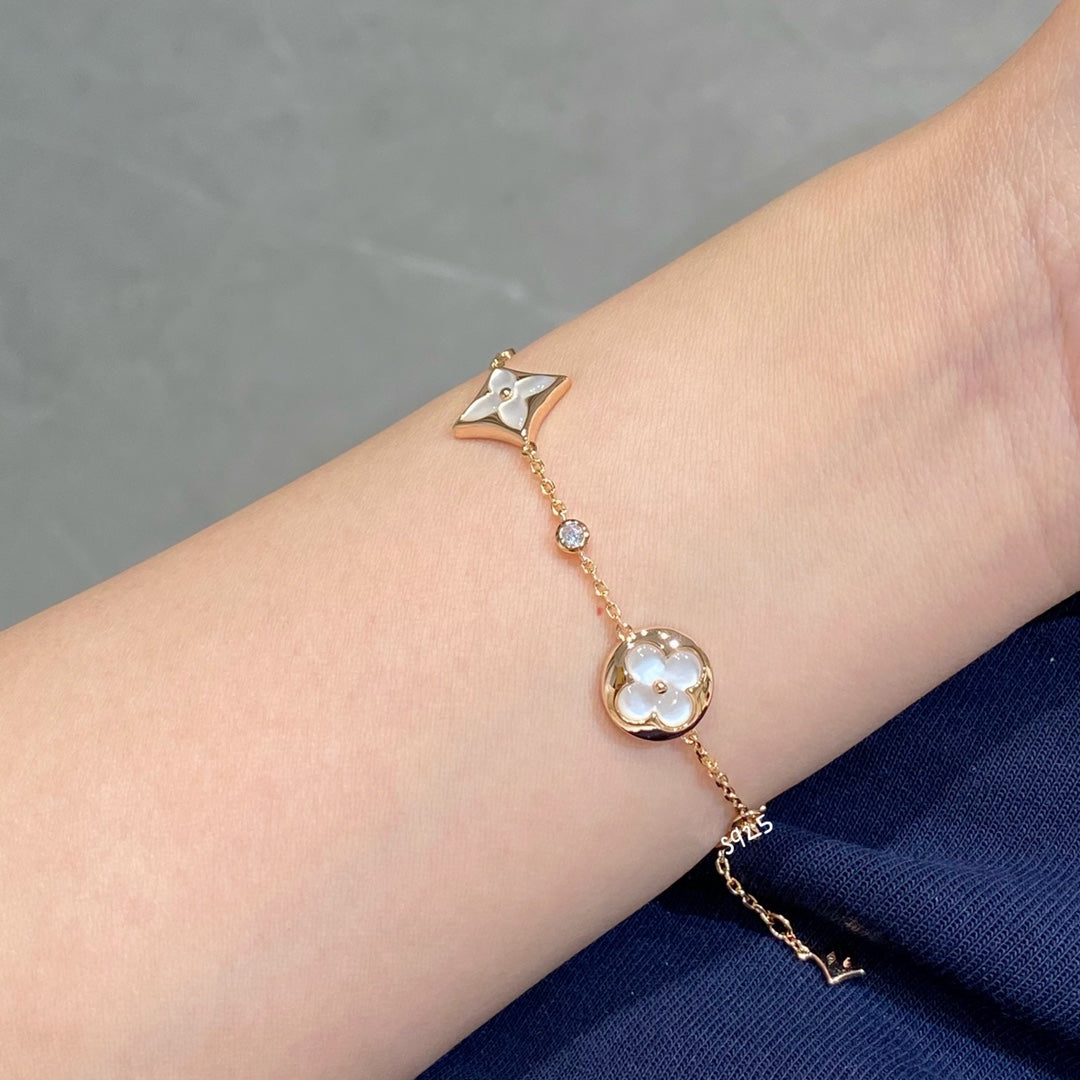 [Renovia Jewelry]STAR AND SUN 4 MOTIF WHITE MOP PINK GOLD BRACELET