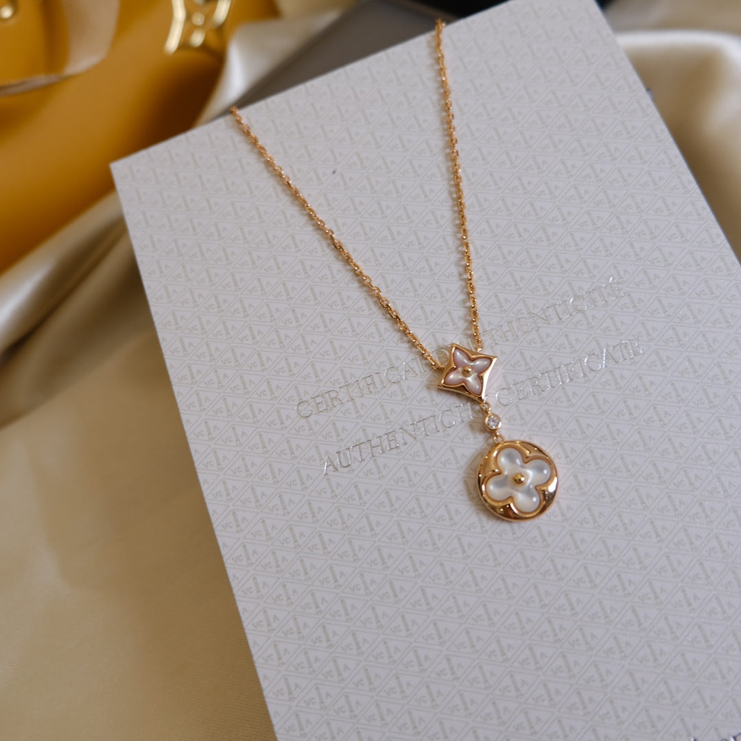 [Renovia Jewelry]STAR AND SUN WHITE MOP 2 MOTIF PINK GOLD NECKLACE